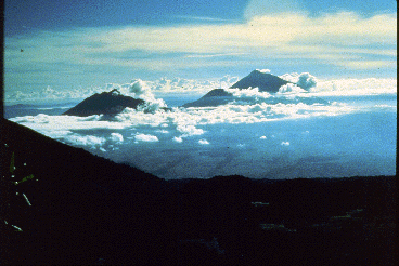 Mountains rising out of the clouds.