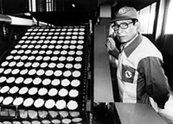 Ando with cup-shaped noodles ready to be fried.